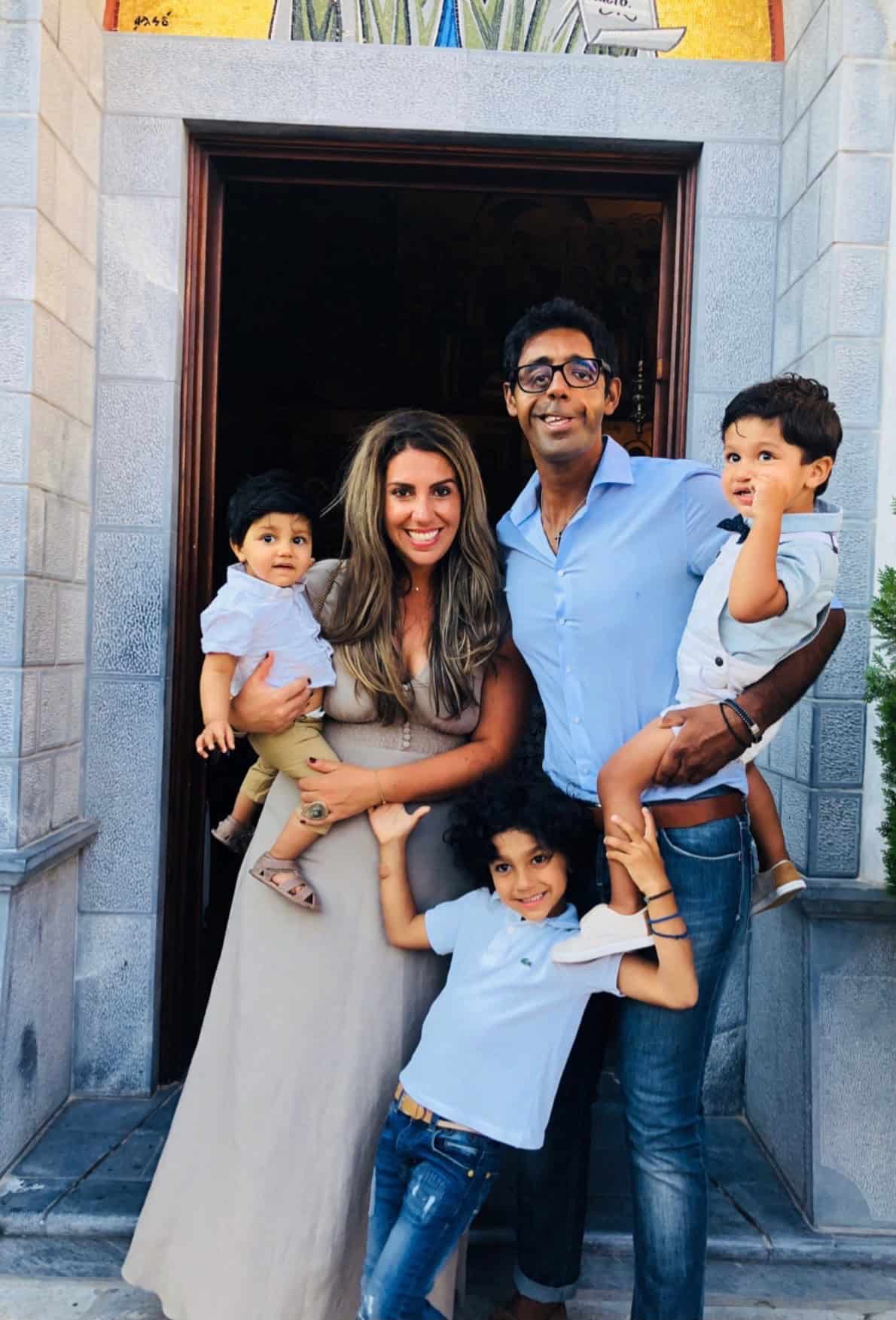 Man who was born with a complex craniofacial cleft with his partner and children