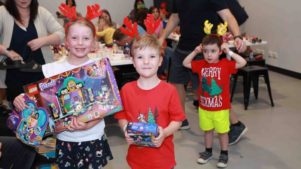 The annual Craniofacial Christmas party for families and Cranio Warriors