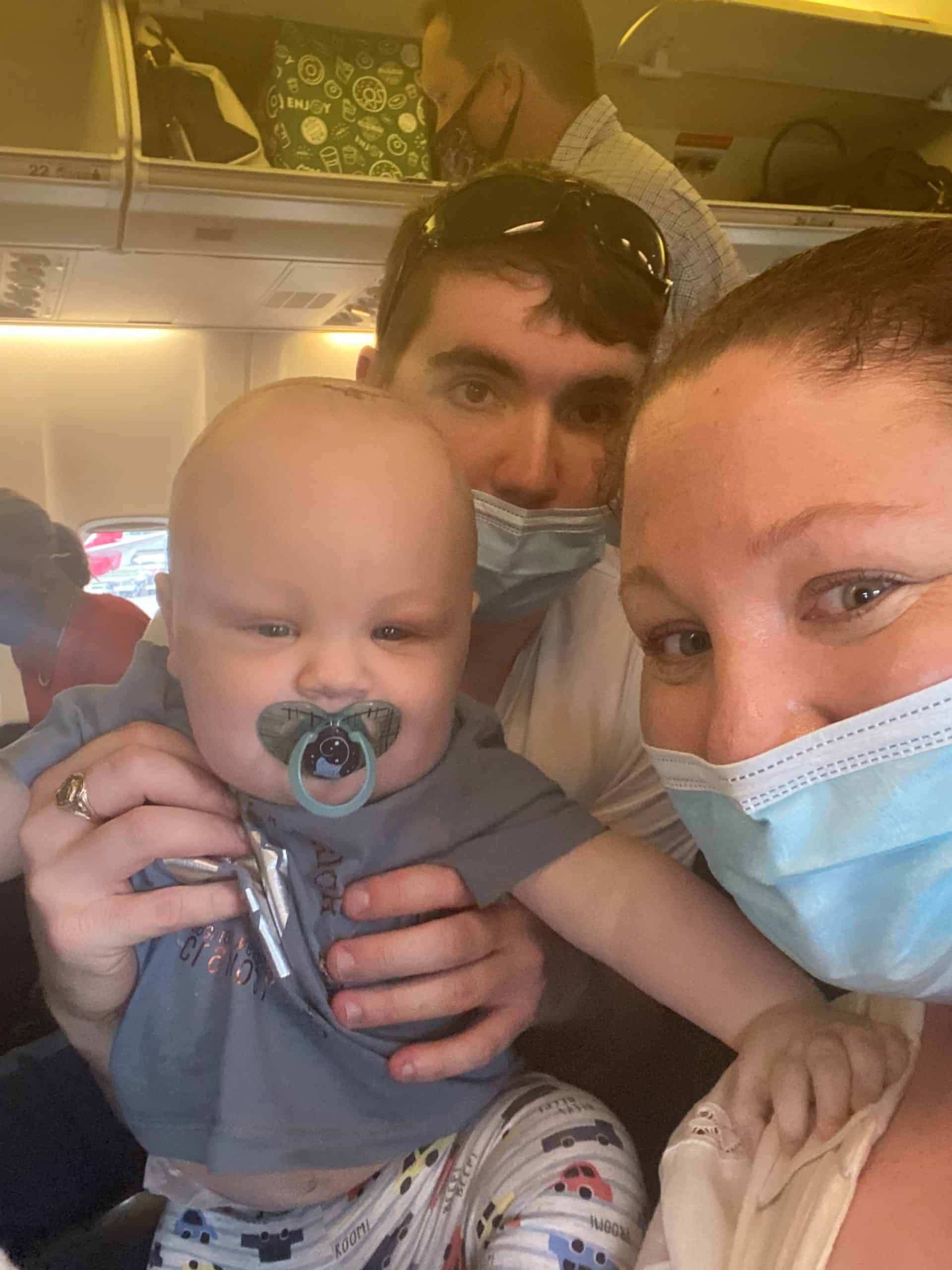 Baby with metopic synostosis and cystic fibrosis with parents